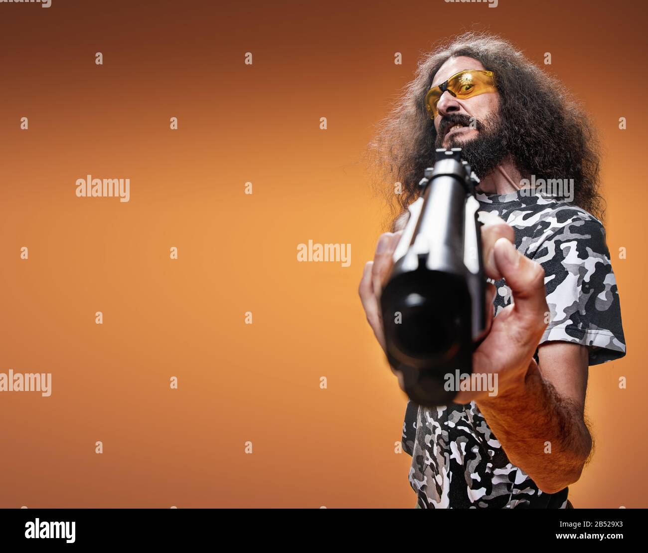 Funny man gun hires stock photography and images Alamy