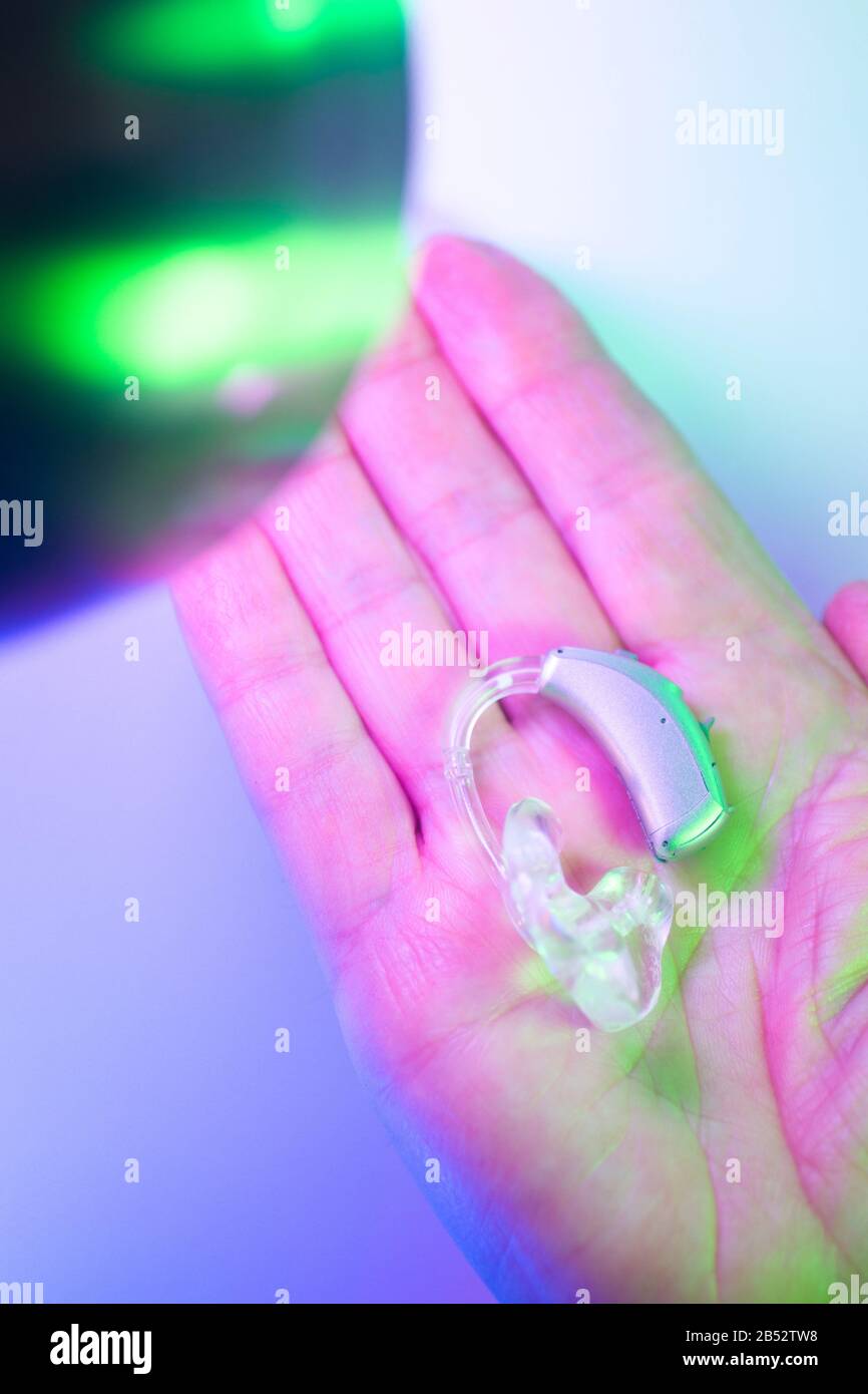Modern digital hearing aid for deafness and deaf people Stock Photo Alamy