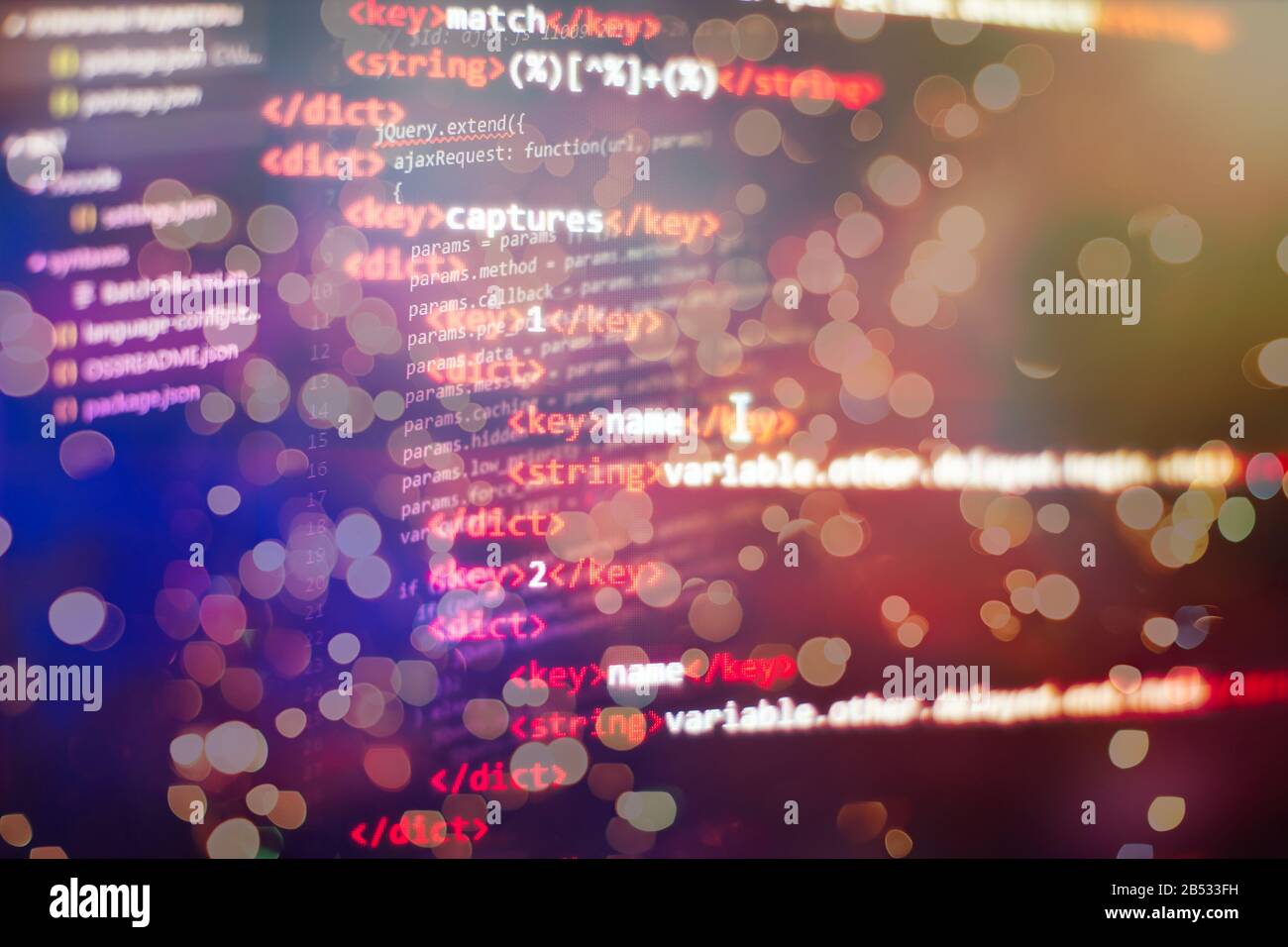 Software developer programming code. Abstract computer script code ...