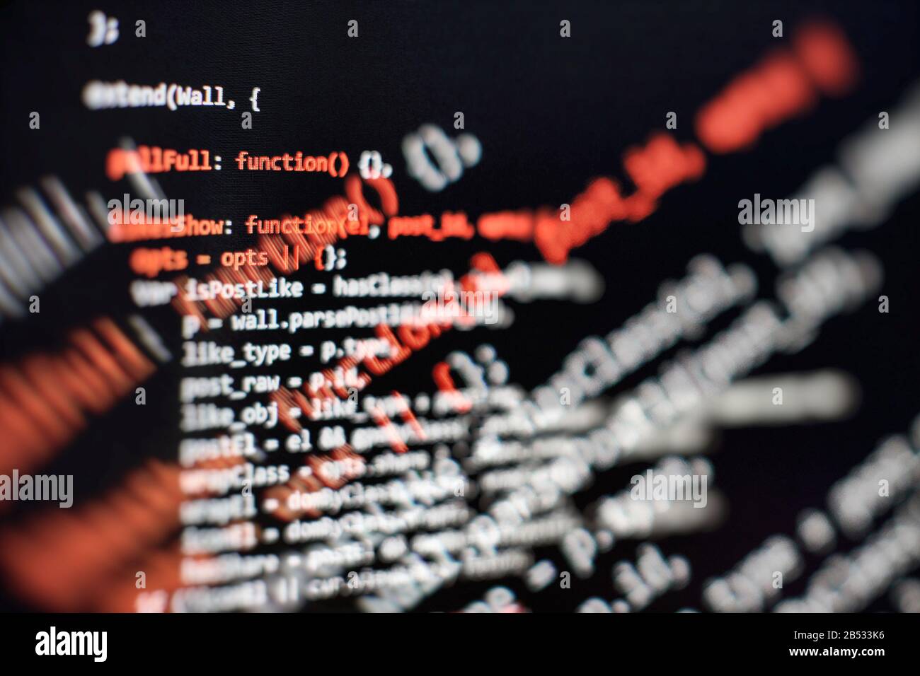 Modern tech. PHP syntax highlighted. Writing programming functions on laptop. Big data and Internet of things trend. Stock Photo