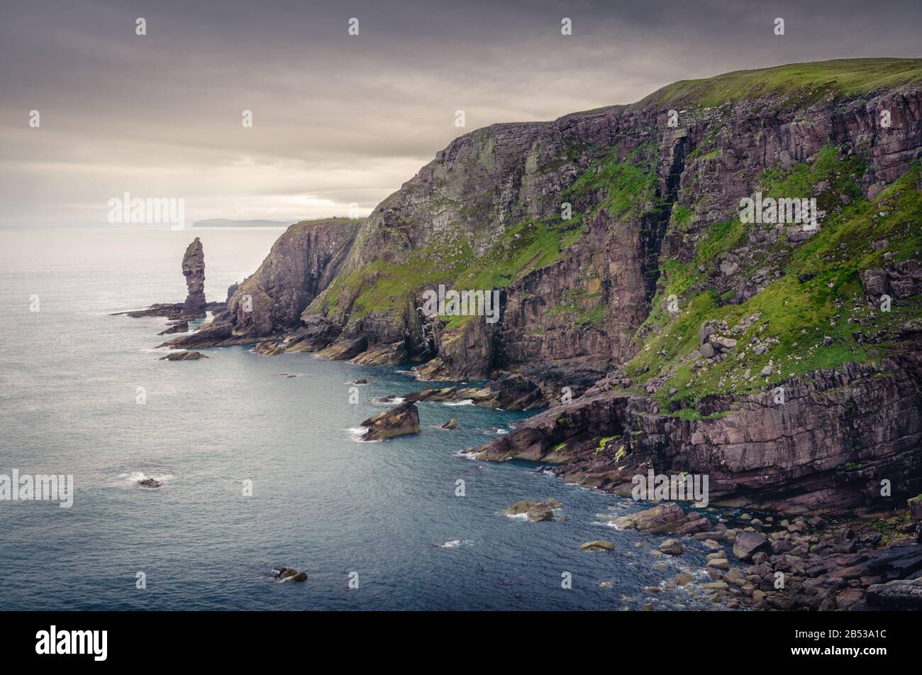 Rock pinacle ponting out of the sea, Old Man of Stoer, Scotland Stock Photo