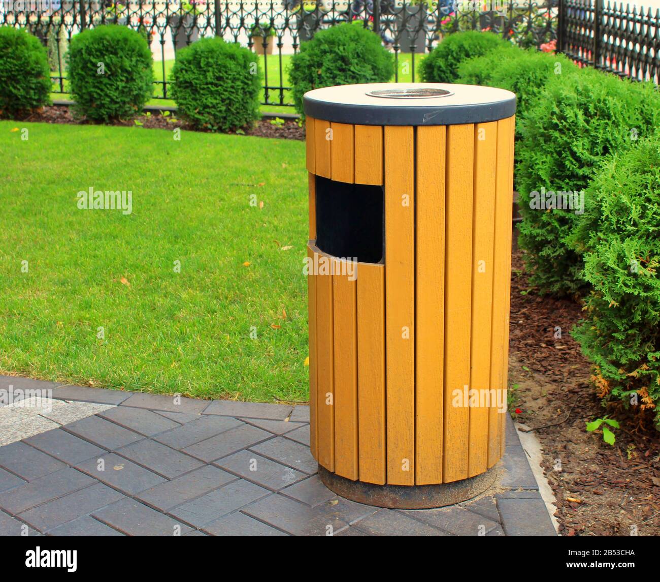 Wood recycle bin on street Stock Photo Alamy