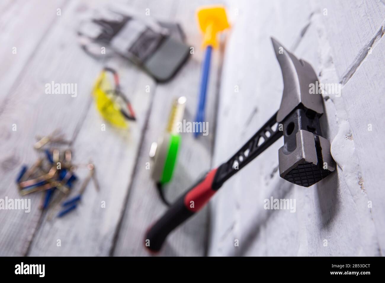Of course, the basic tool of any builder is a hammer. The correct use