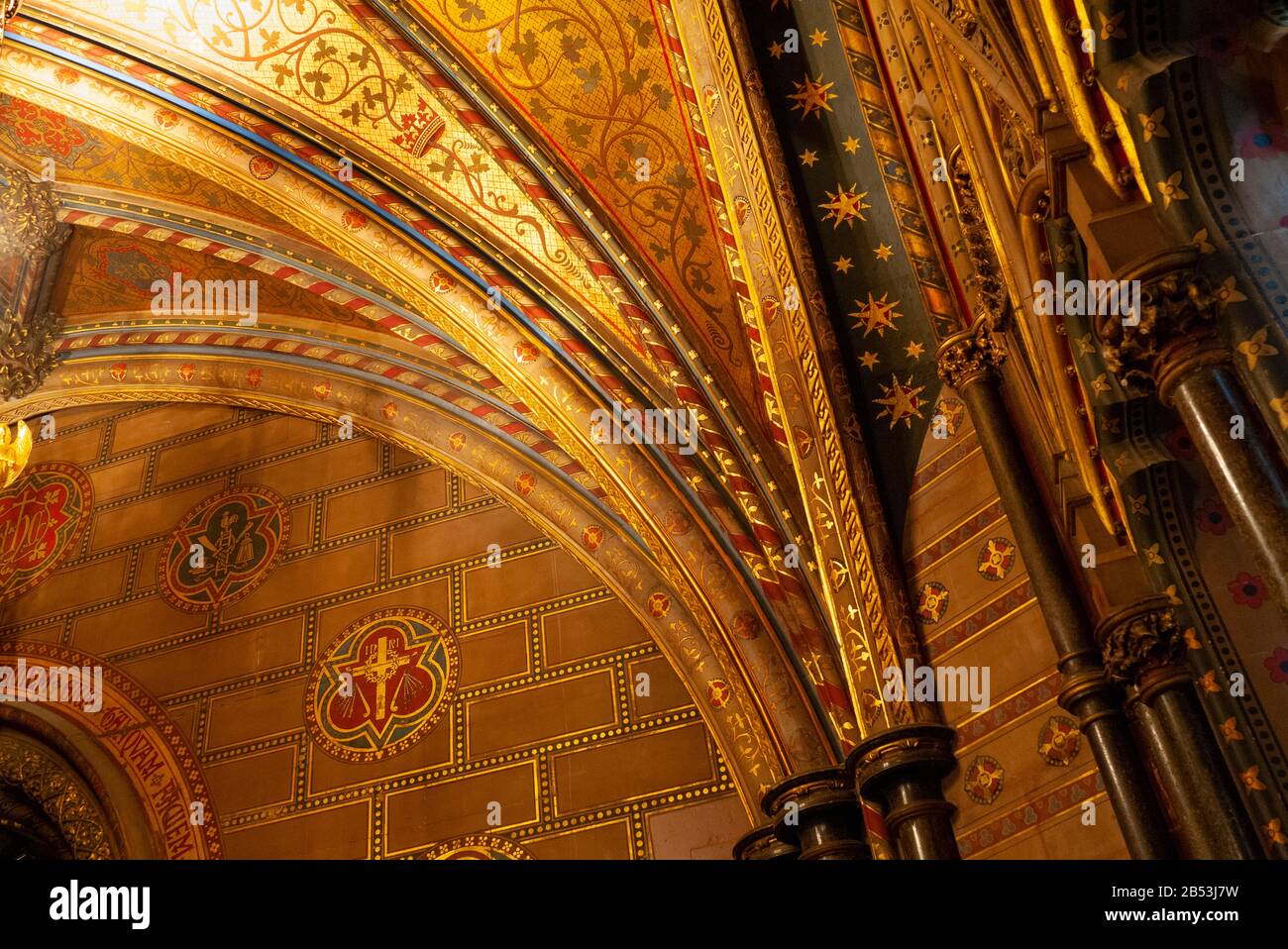 The highly decorated vaulted ceiling of the Chapel of St Mary Undercroft in the Palace of Westminster, London, England Stock Photo