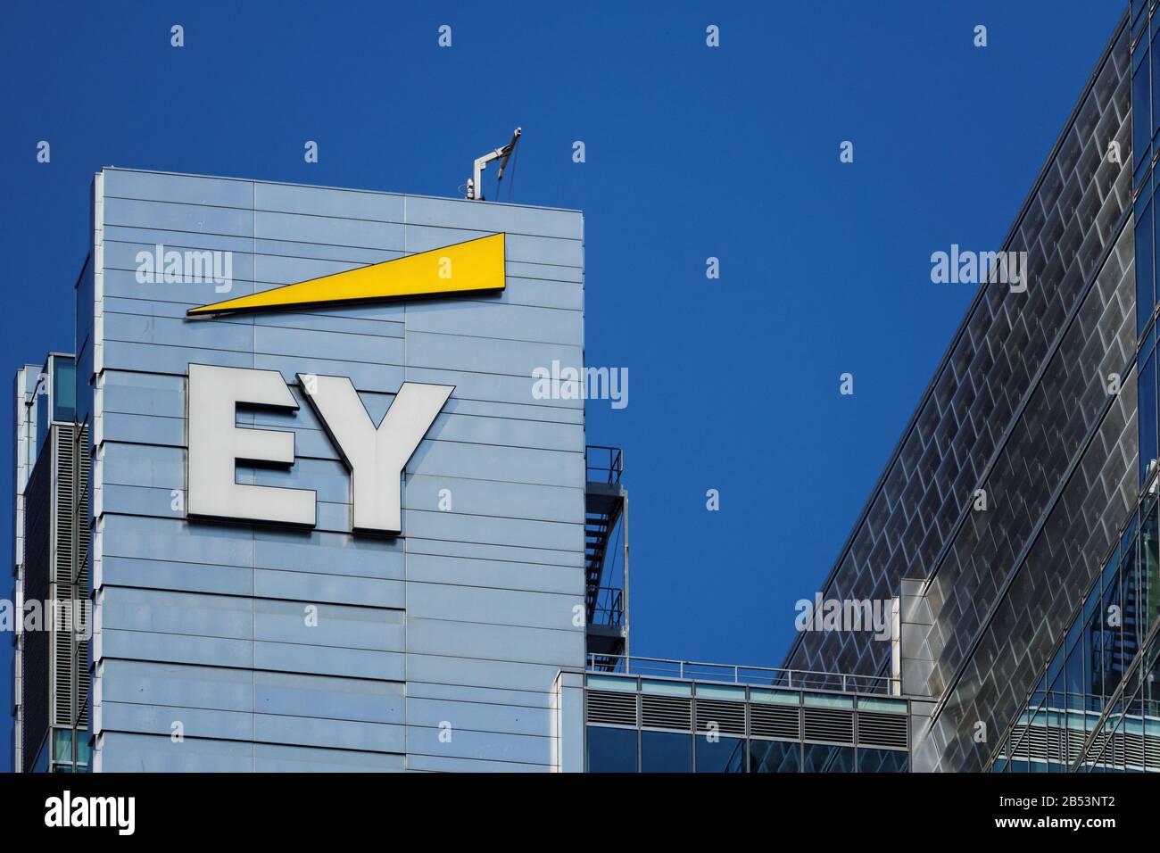 EY (previously Ernst&Young) logotype visible from the street Stock Photo