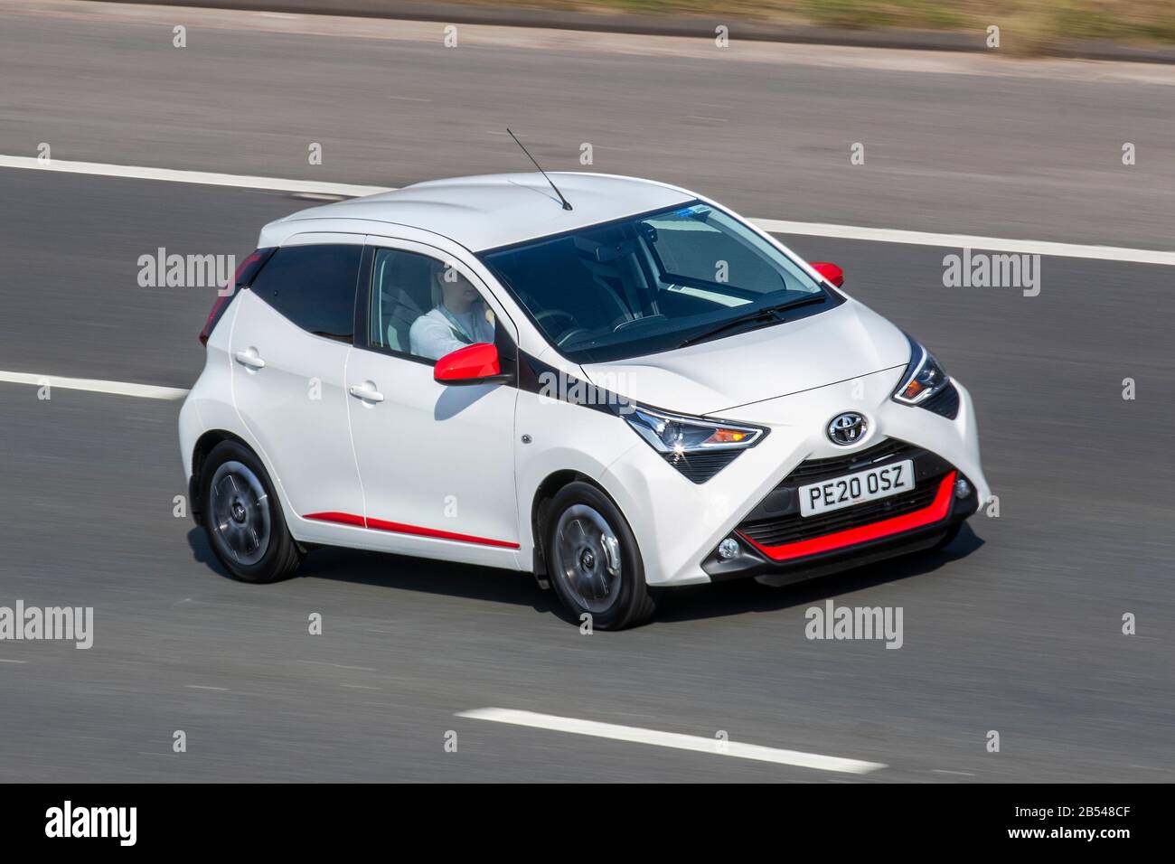 Ærlighed sprogfærdighed Modtager 2020 new White red Toyota Aygo (Ay2) hatchback; UK vehicular traffic,  transport, modern vehicles, saloon cars, vehicles, vehicle, roads, motors,  motoring south-bound on the M6 motorway highway Stock Photo - Alamy