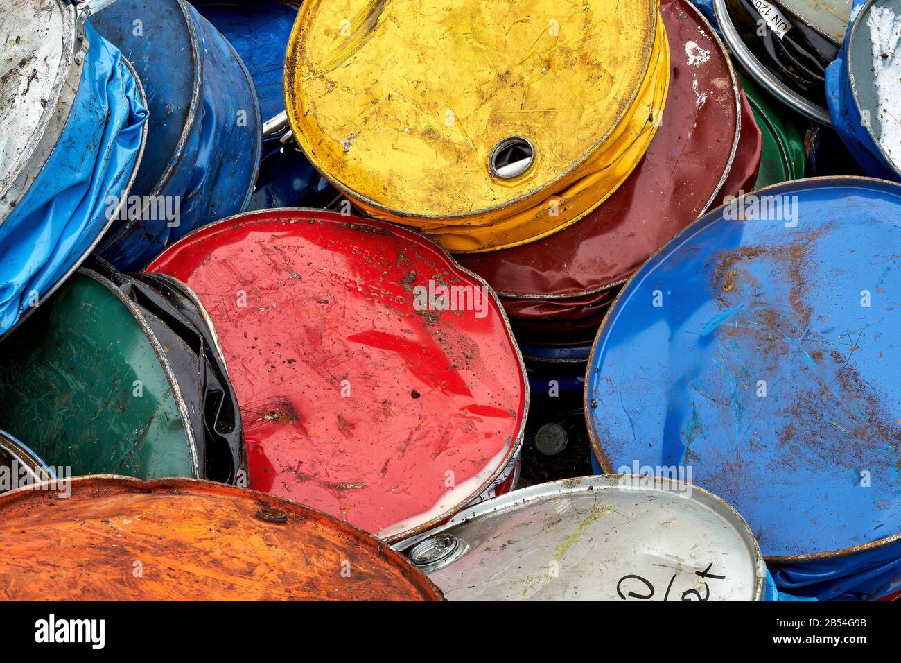 Pressed colorful metal drums in a recycling factory Stock Photo Alamy