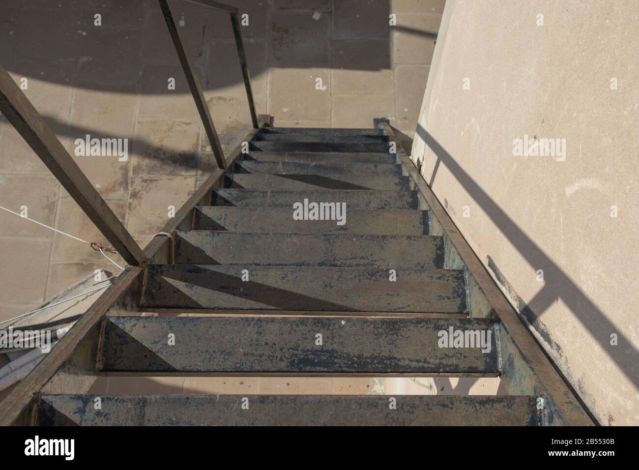 Steep metal stairs. Dangerous metal staircase Stock Photo - Alamy