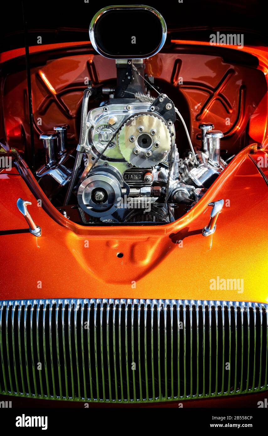 The modified engine of a classic hot rod car. Stock Photo