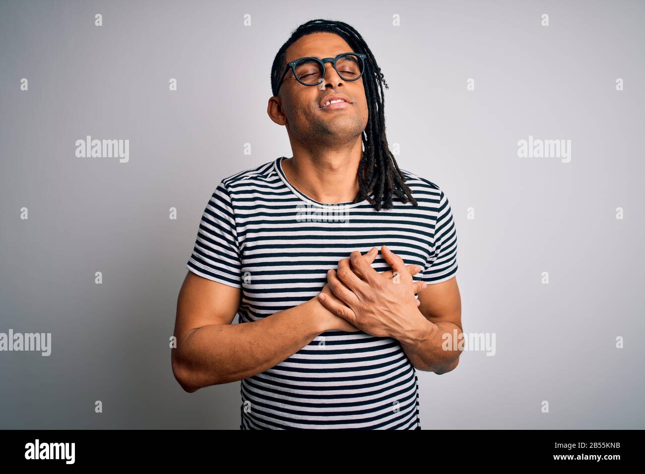 Dreadlocks Chest Young handsome african american man with dreadlocks wearing striped t ...
