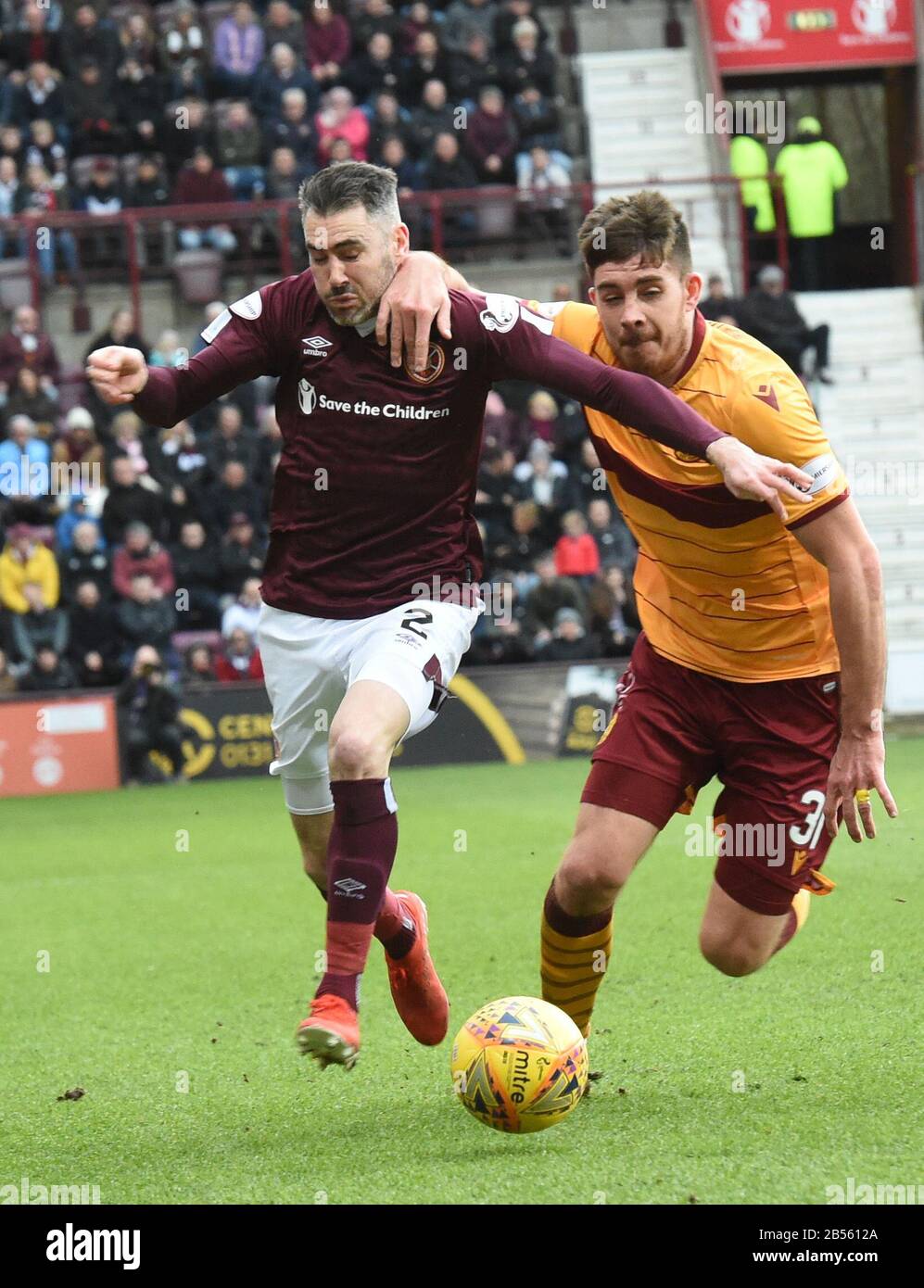 Tynecastle Park .Edinburgh.Scotland.Uk 7th March 20 Scottish Premiership Hearts v Motherwell. L/r Hearts Michael Smith tussle with Hearts Declan Gallagher Credit: eric mccowat/Alamy Live News Stock Photo
