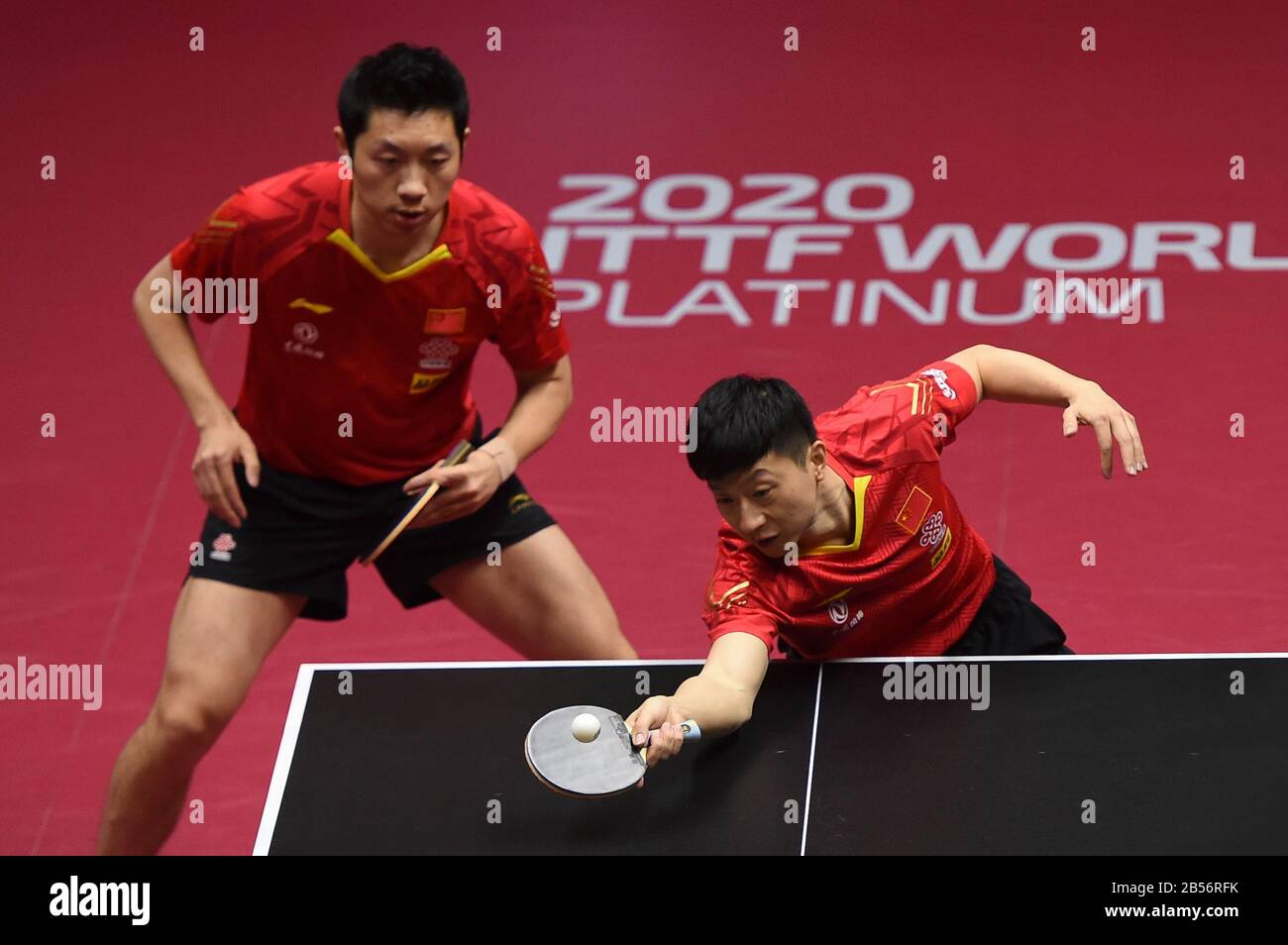 Doha. 7th Mar, 2020. Ma Long (R)/Xu Xin of China compete during the men's  doubles final match against Liam Pitchford /Paul Drinkhall of England at 2020  ITTF Qatar Open in Doha, Qatar