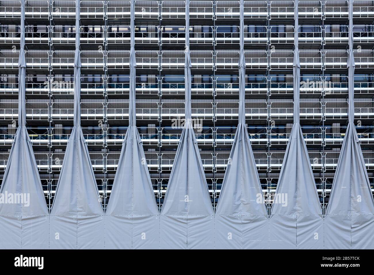 Tarpaulins and scaffold around a building under repair in Tokyo, Japan. Stock Photo