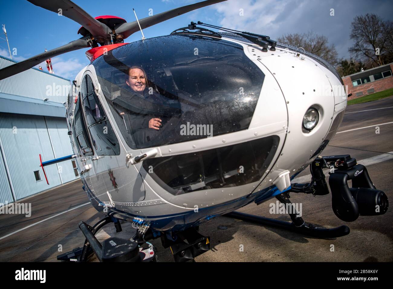 Rastede, Germany. 04th Mar, 2020. Kirsten Böning, helicopter pilot, is sitting in the police helicopter model EC 135 Böning is the first police helicopter pilot in Lower Saxony, after a good year in service she takes stock. Credit: Sina Schuldt/dpa/Alamy Live News Stock Photo