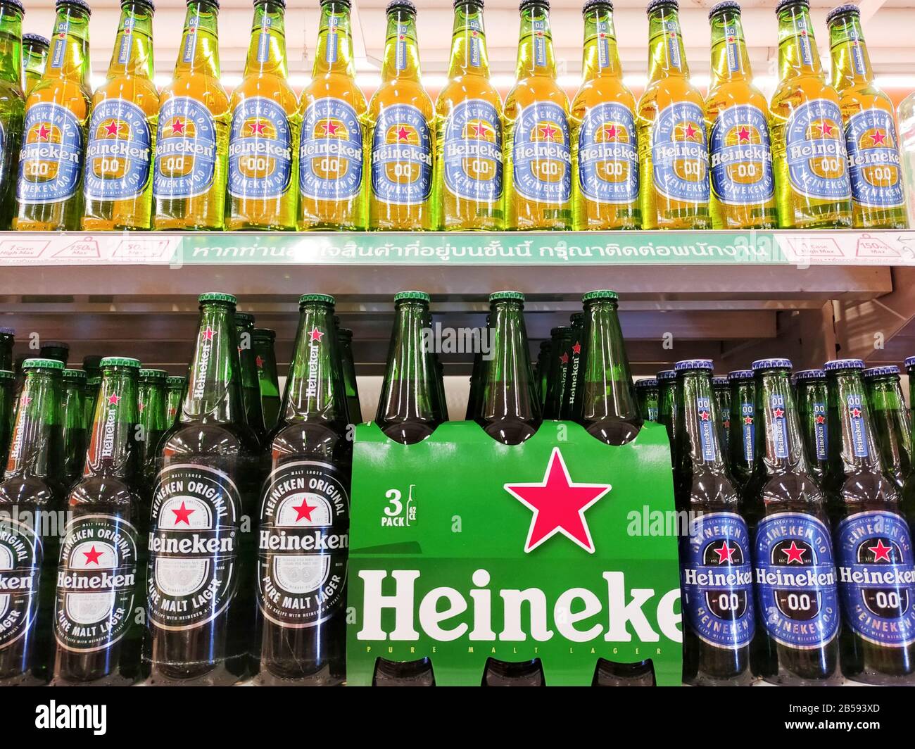 Bottles of Heineken beer on display in a supermarket Stock Photo Alamy