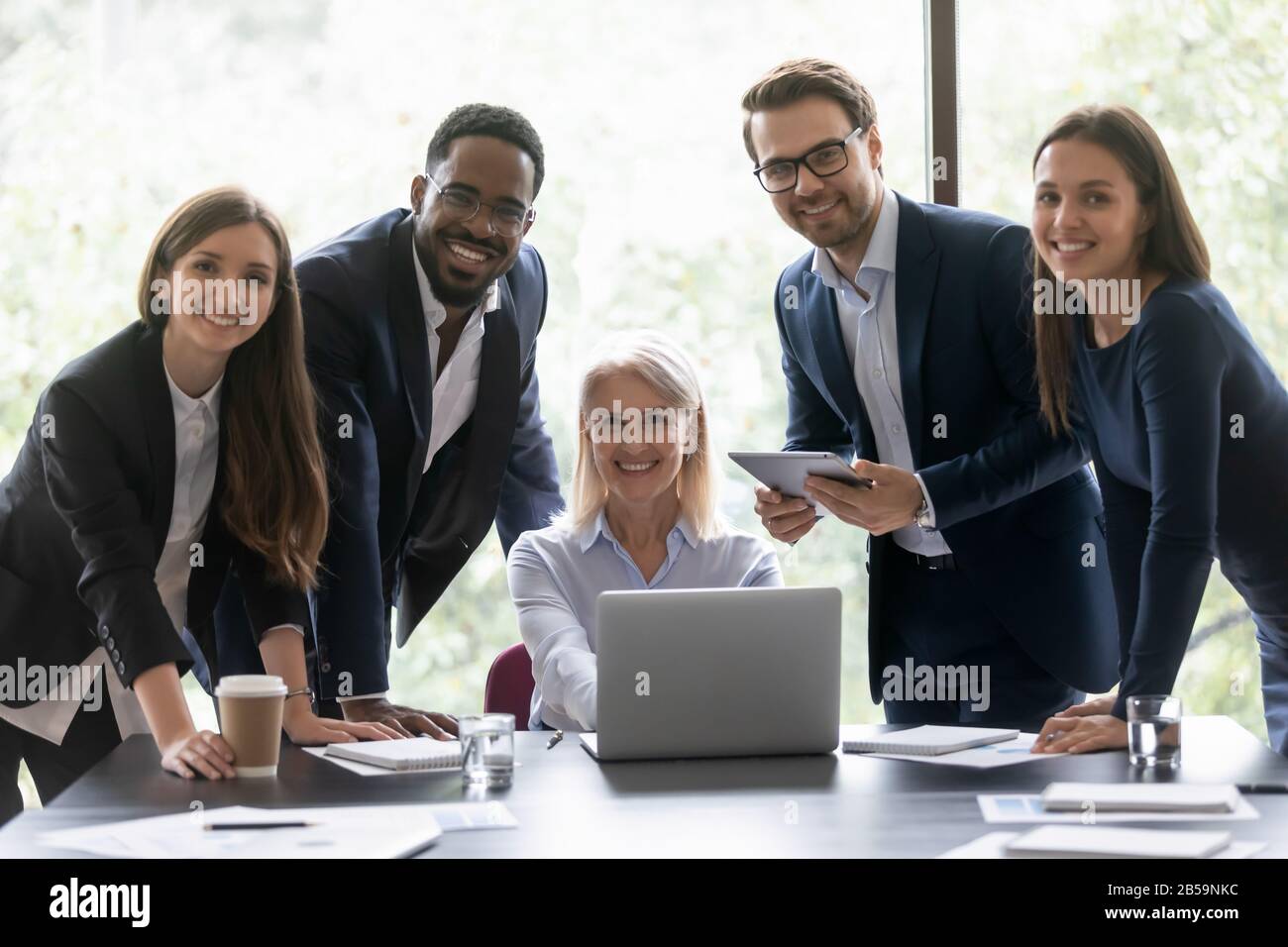 Portrait of diverse businesspeople cooperate in office Stock Photo