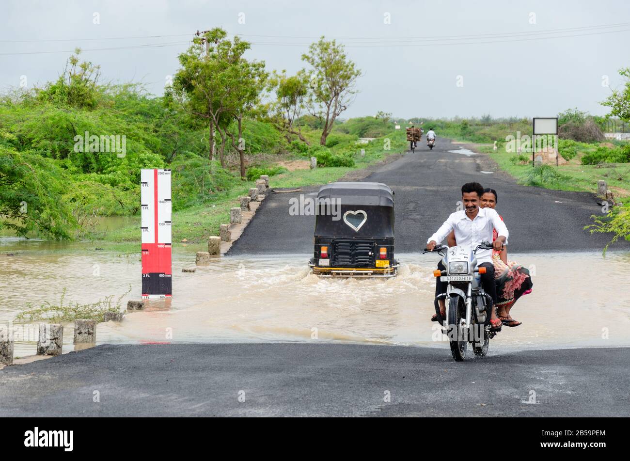 Roadside water level indictor that marks the depth of flood water during heavy rains in Mandvi, Kutch, Gujarat, India Stock Photo