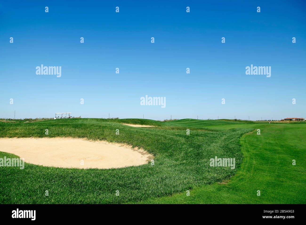 Sand bunker on the golf course Stock Photo - Alamy