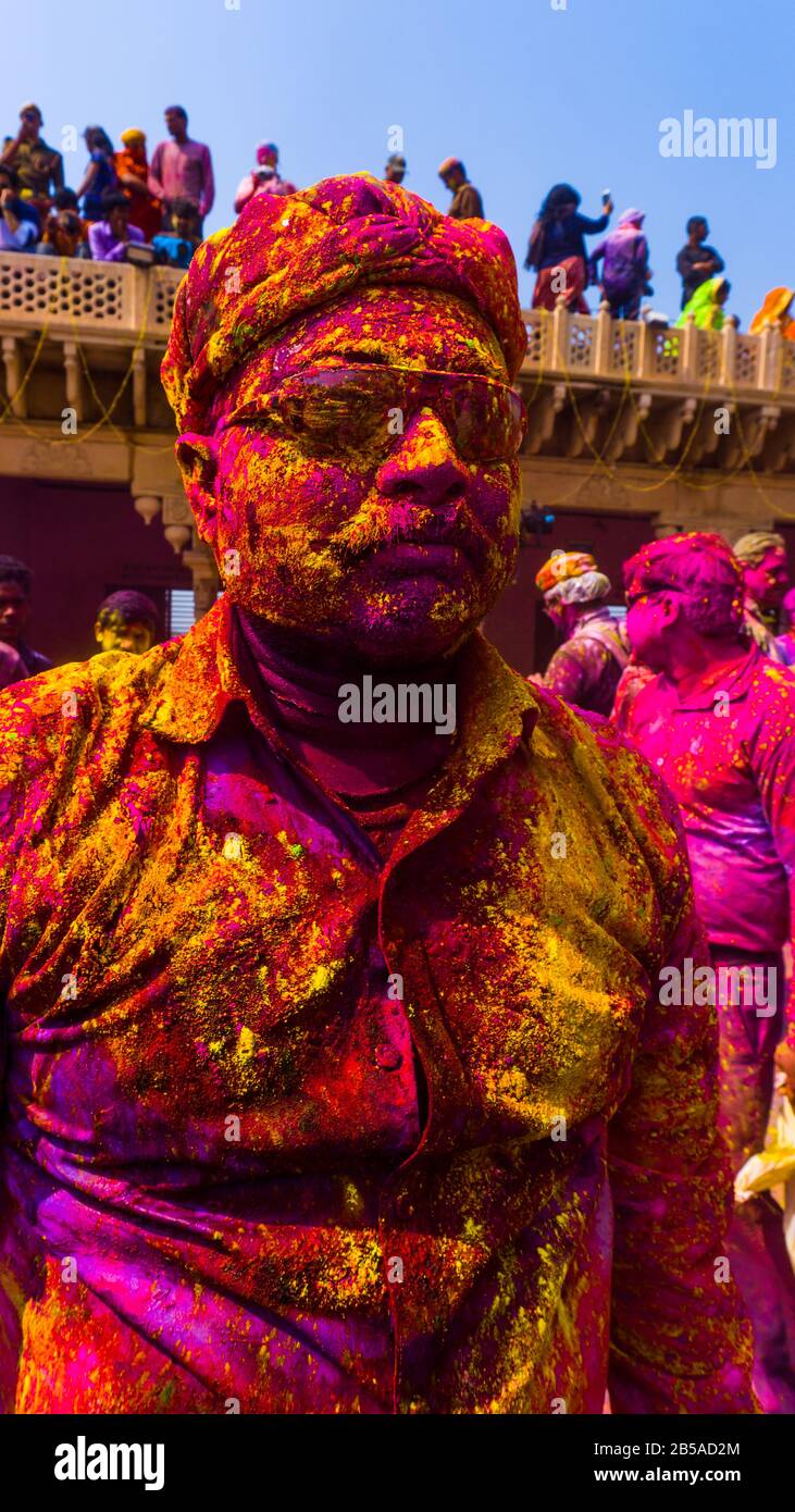 Mathura holi festival. people celebrating holi with colors. Stock Photo