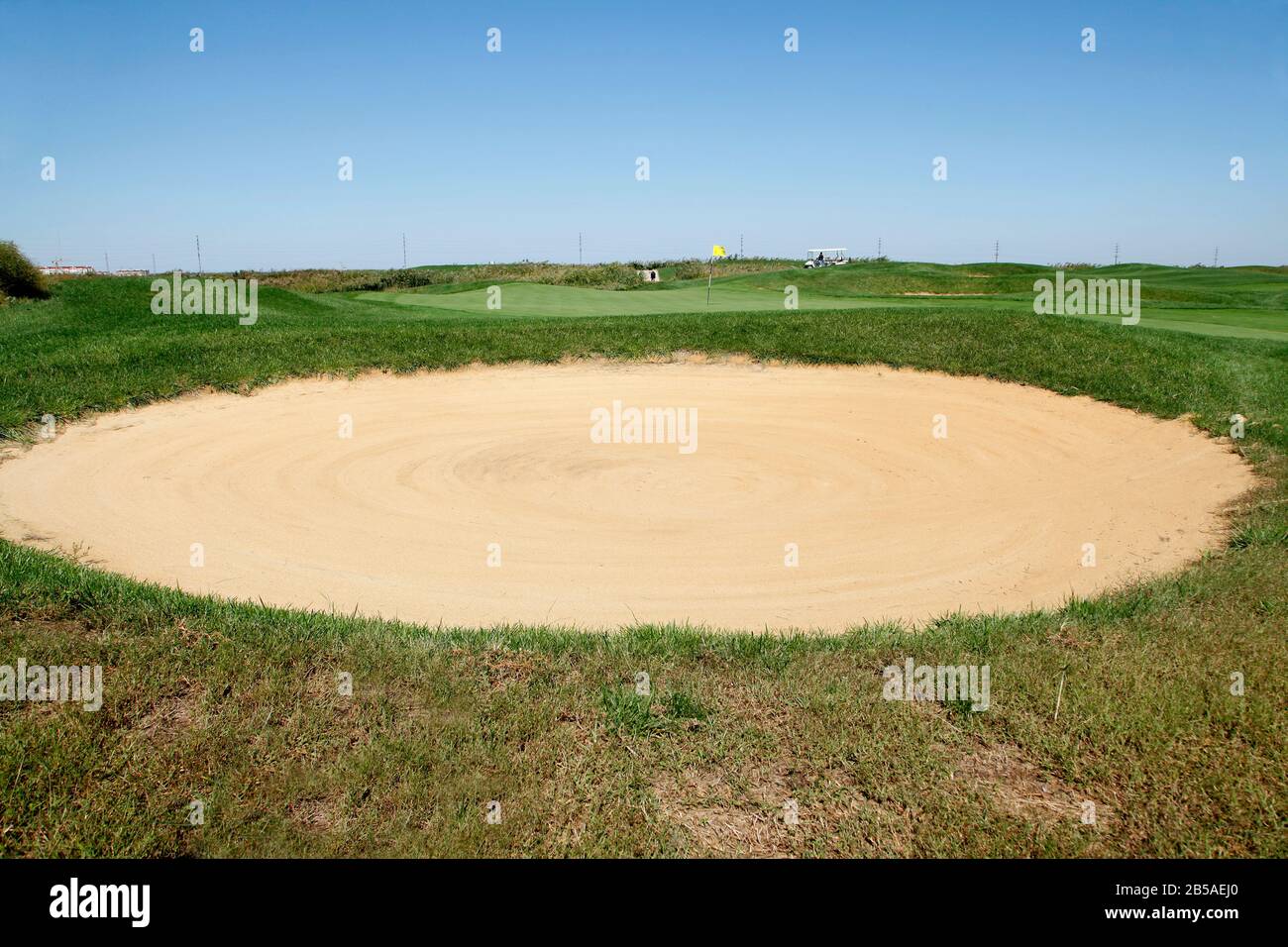 Sand bunker on the golf course Stock Photo Alamy