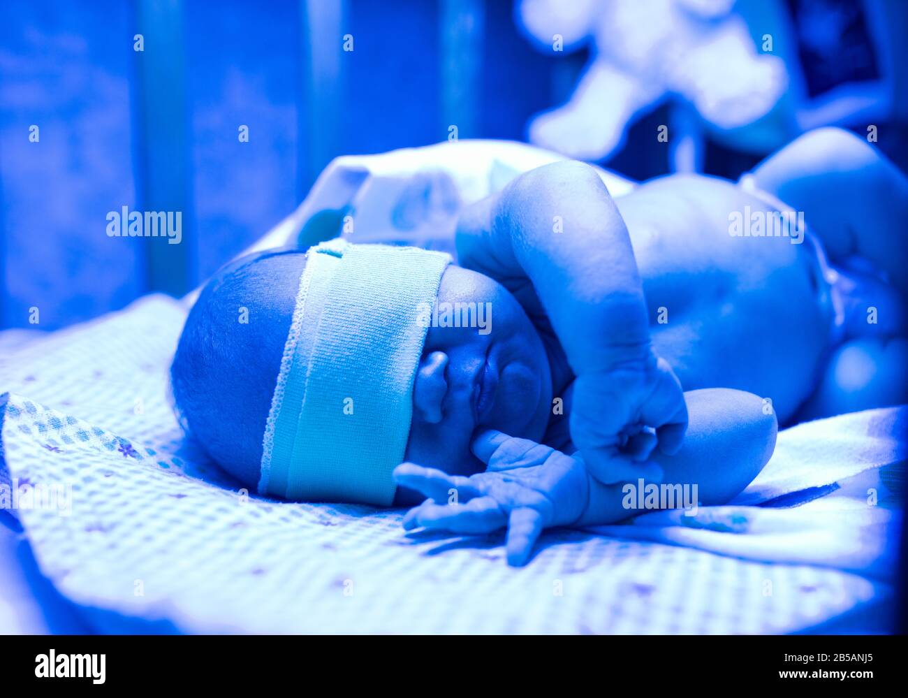 Newborn having a treatment for jaundice under ultraviolet light, Baby