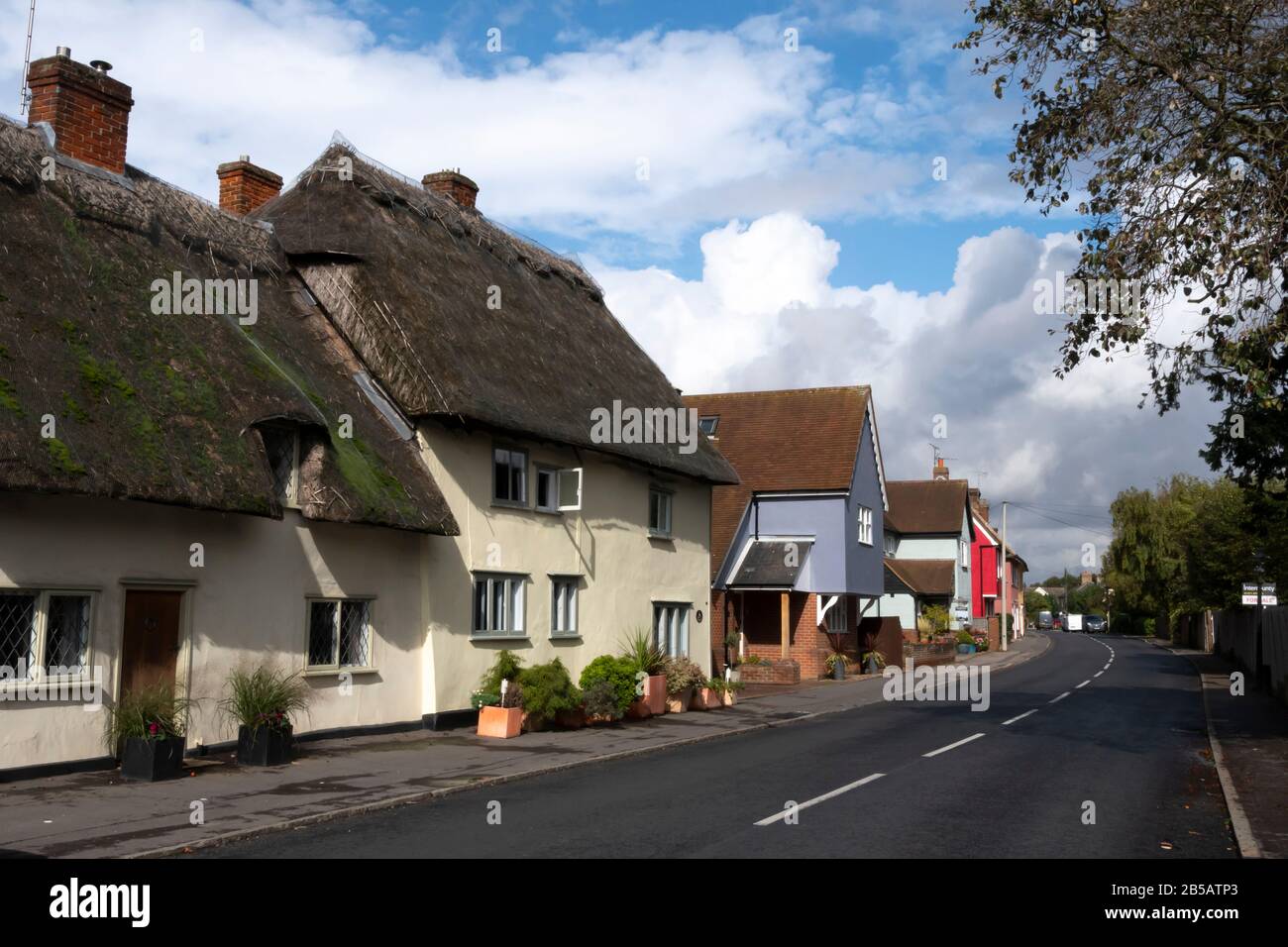 Thatched cottages and coloured houses, Thaxted, Essex, England Stock