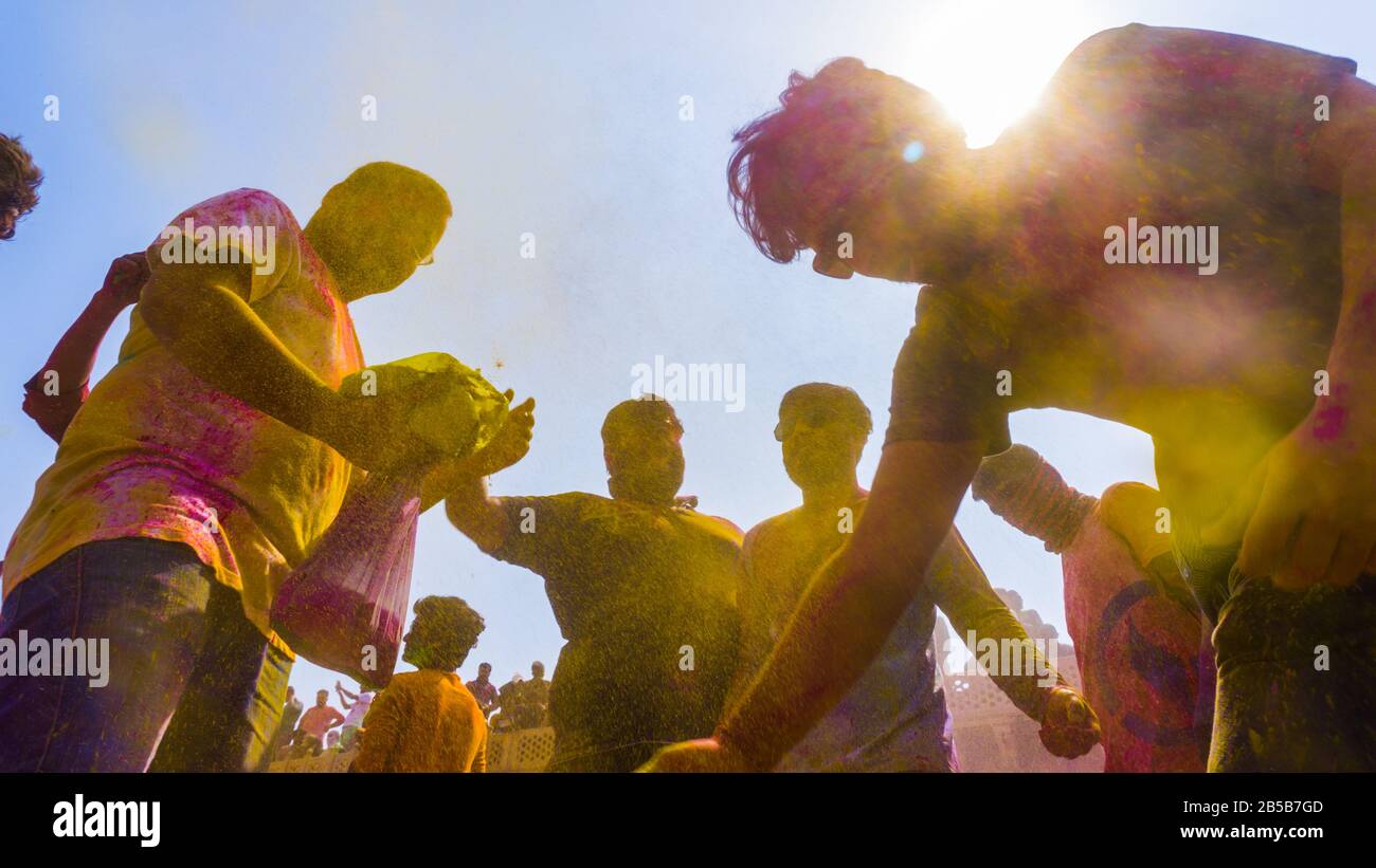 Mathura holi festival. people celebrating holi with colors. Stock Photo