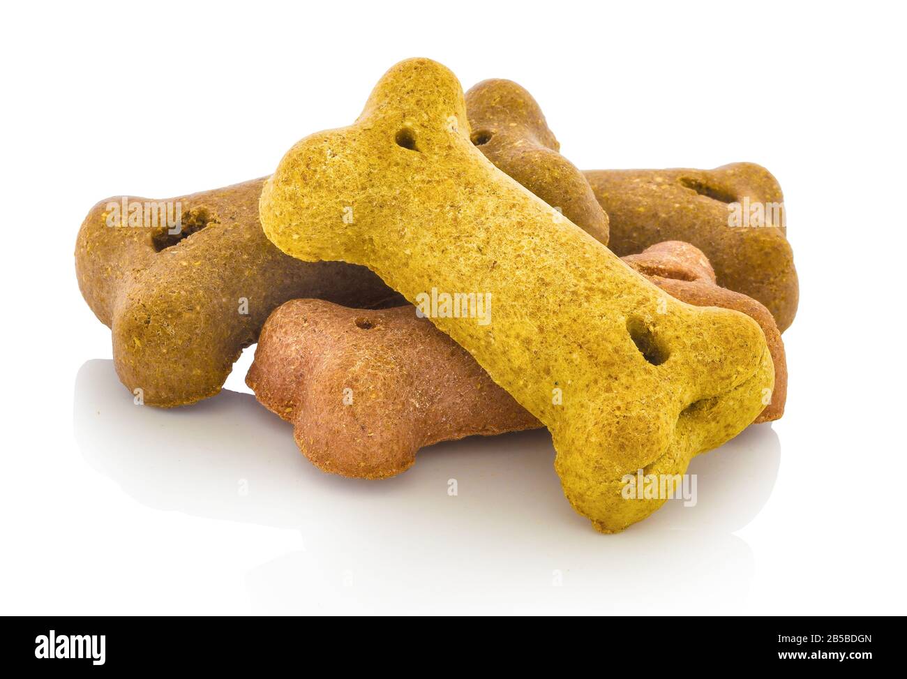 Small bones for dog. Dog snack. Foodie Puppies Flavor Bone Shaped Biscuits  for Dogs. Isolated on white background with shadow reflection. With clippin  Stock Photo - Alamy
