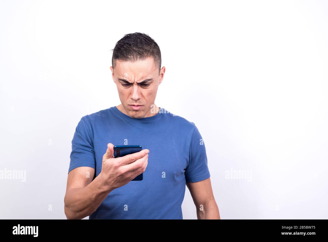 Worried man. White background, Medium shot Stock Photo