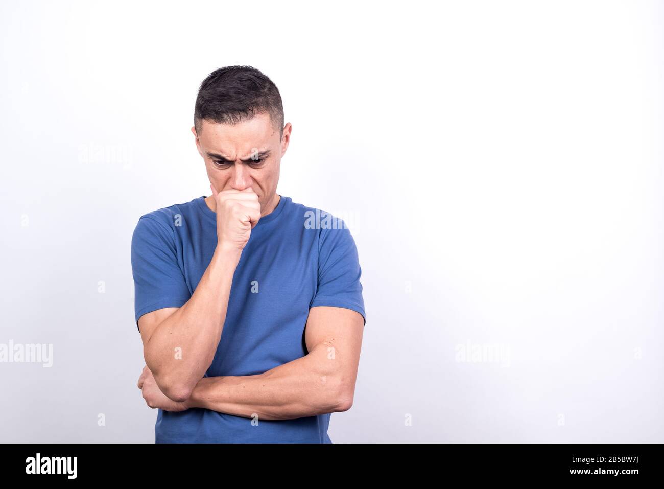 Worried man. White background, Medium shot Stock Photo