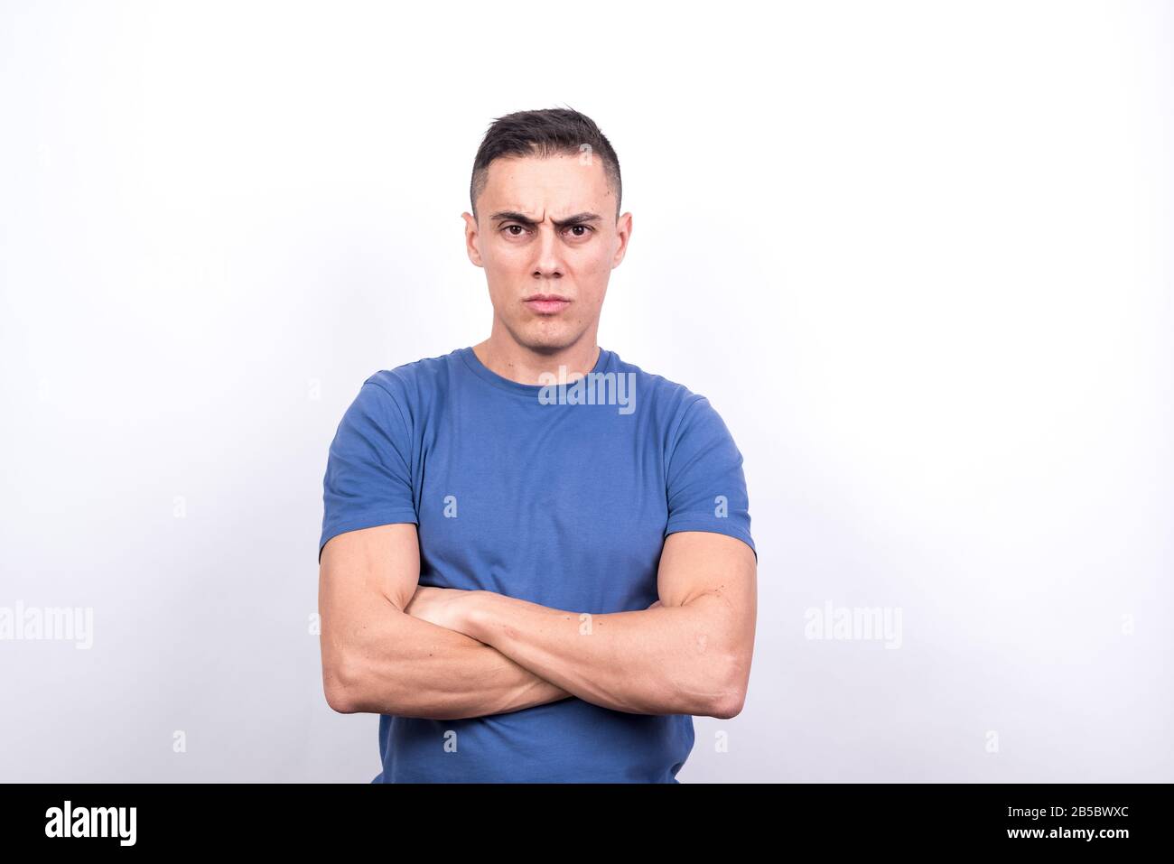 Serious man. White background, Medium shot Stock Photo