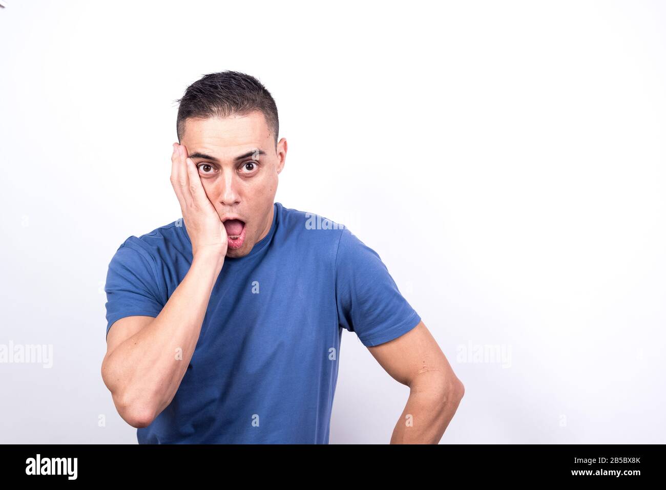 Surprised man. White background, Medium shot Stock Photo