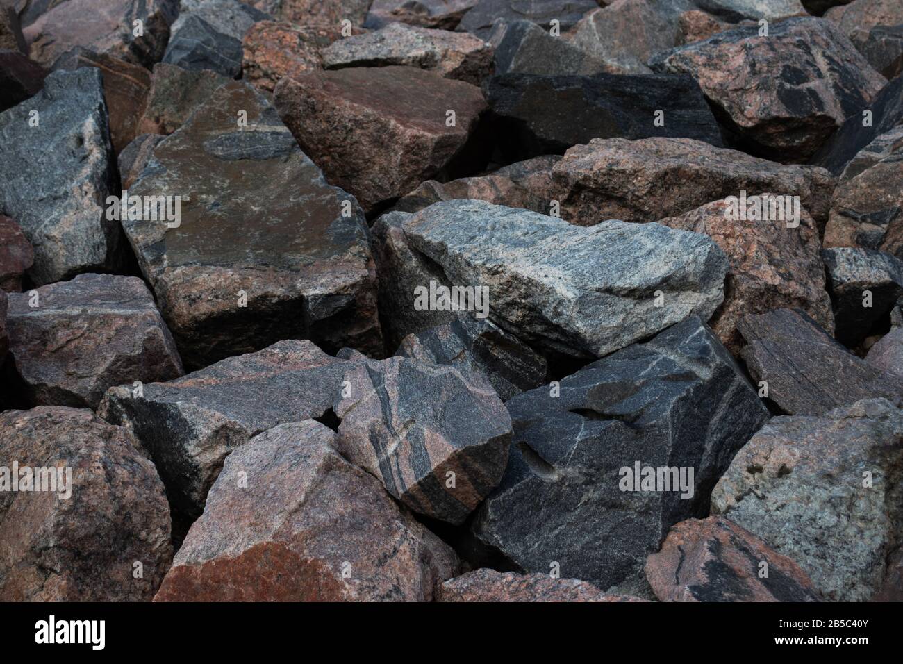 A pile of large pieces of stone or rock. Natural background. Copy space Stock Photo