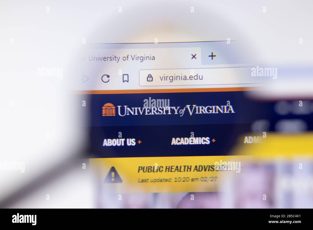 Los Angeles, California, USA - 7 March 2020: University of Virginia website homepage logo visible on display close-up, Illustrative Editorial Stock Photo