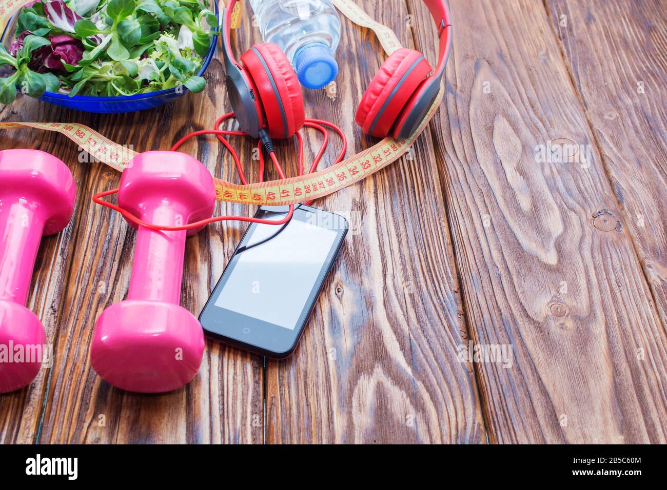 Fresh Organic Vegetables With Dumbbells On A Wooden Countertop Copy Space Diet And The Concept Of Healthy Eating Headphones And Phone Music In Sp Stock Photo Alamy