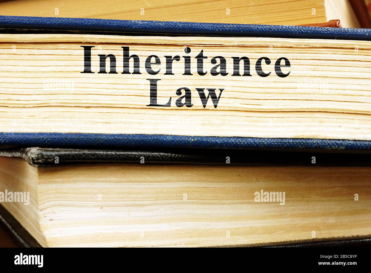 Inheritance law and stack of books Stock Photo - Alamy