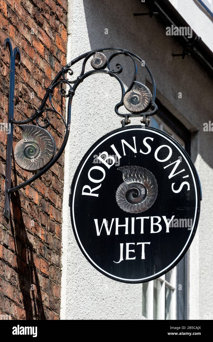 One of the many small Whitby Black Jet shop signs in the historic old quarter of Whitby, a