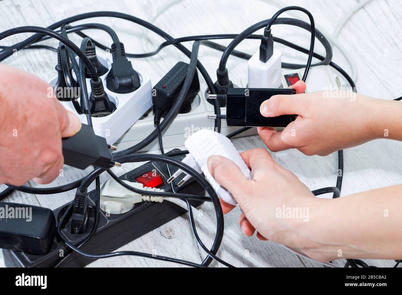Lots of electrical outlets-enabled devices. Power saving. Stock Photo