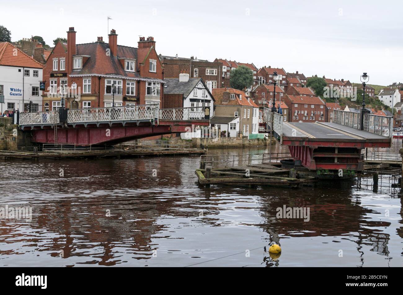 The swing bridge on the river Ask connecting the historical side of Whitby with the main shopping side of Whitby on the east coast in North Yorkshire, Stock Photo