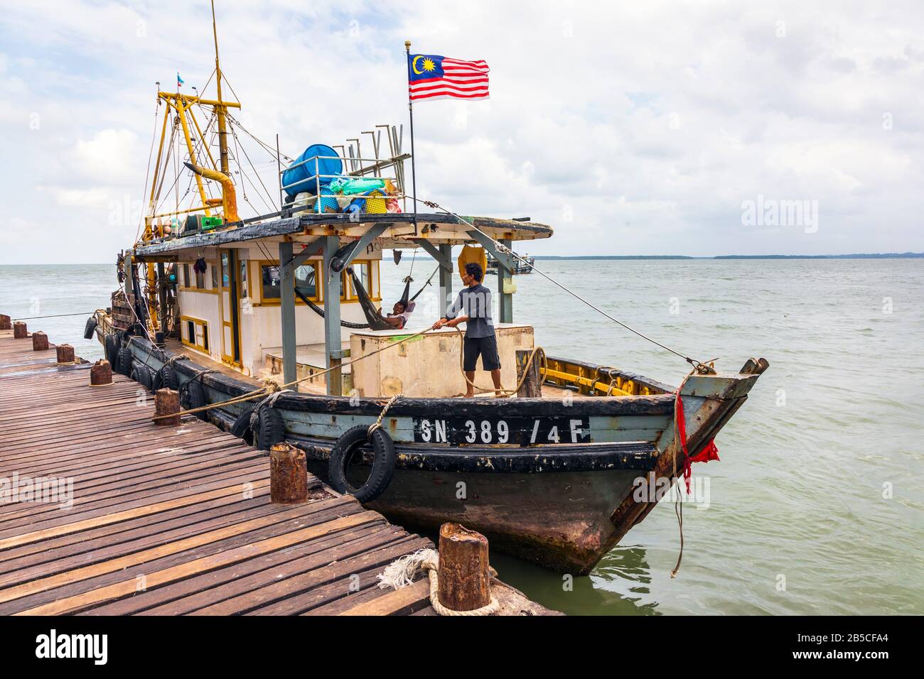 Fishing boat tying up at Sandakan harbour on the Sulu Sae, Sabah