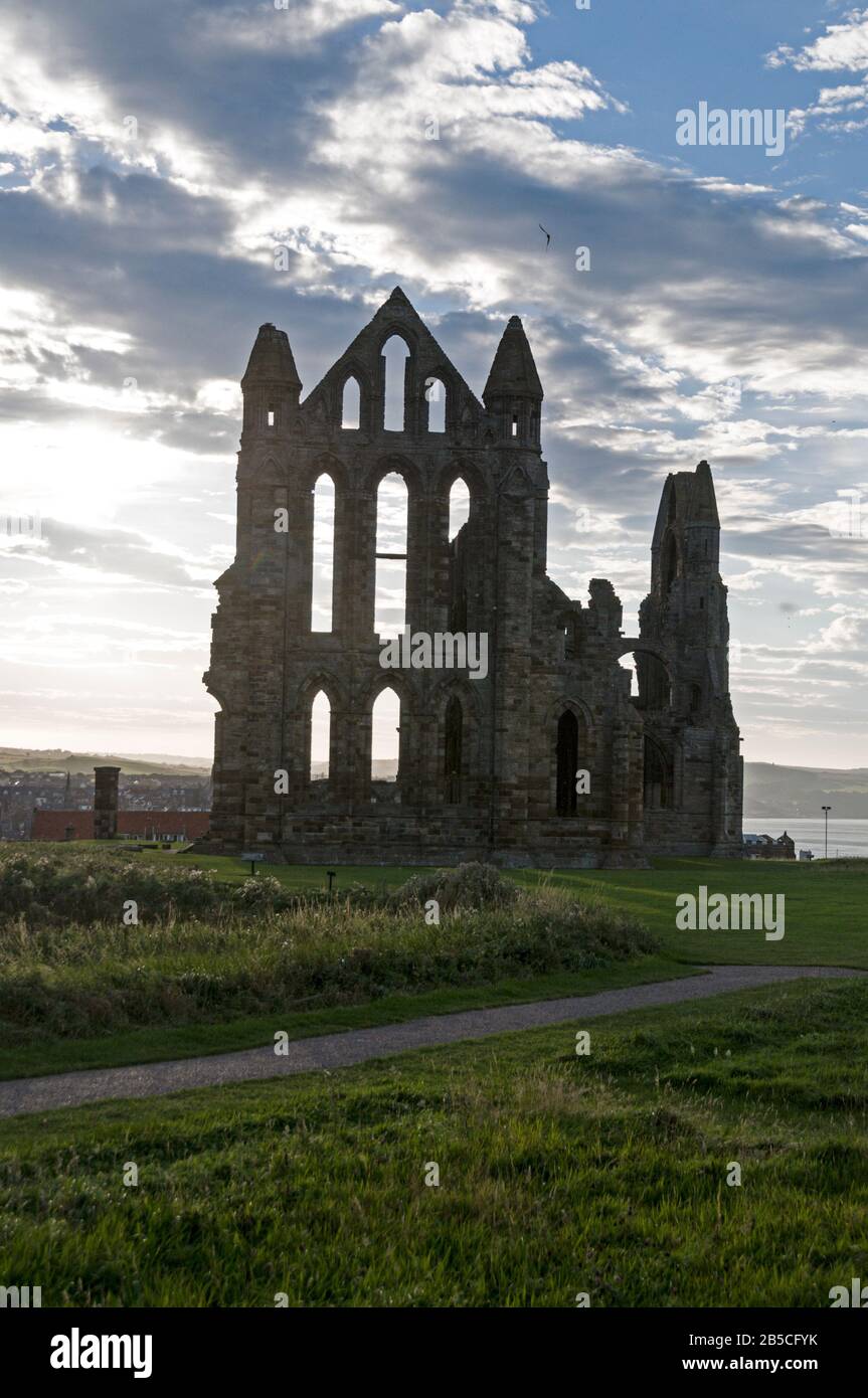 The historical landmark ruins of the 7th century Abbey of St. Hilda  known as Whitby Abbey at Whitby in North Yorkshire, Britain.   The Abbey was part Stock Photo