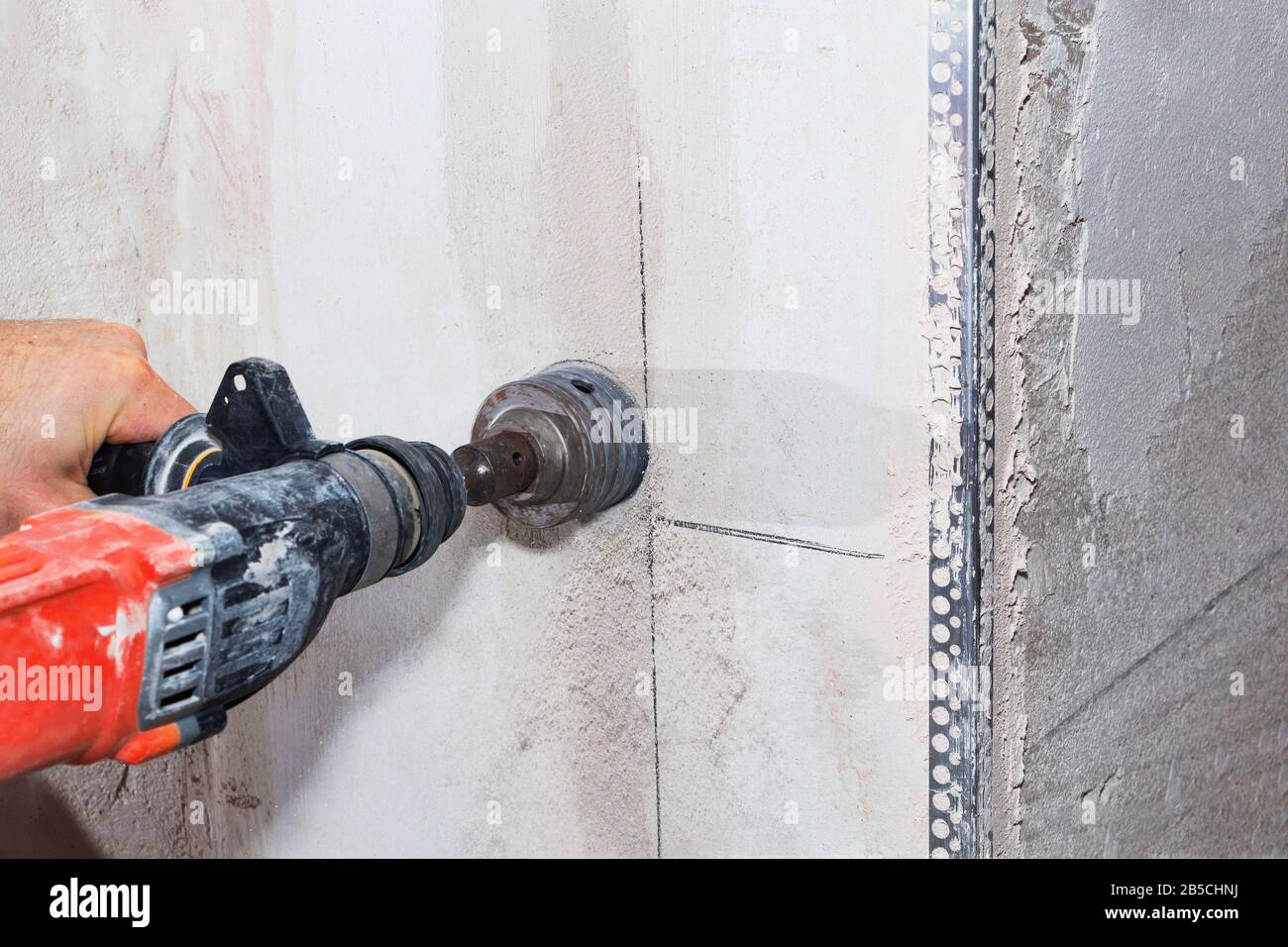 drill hole for electrical outlet outlet, special power tool drill Stock