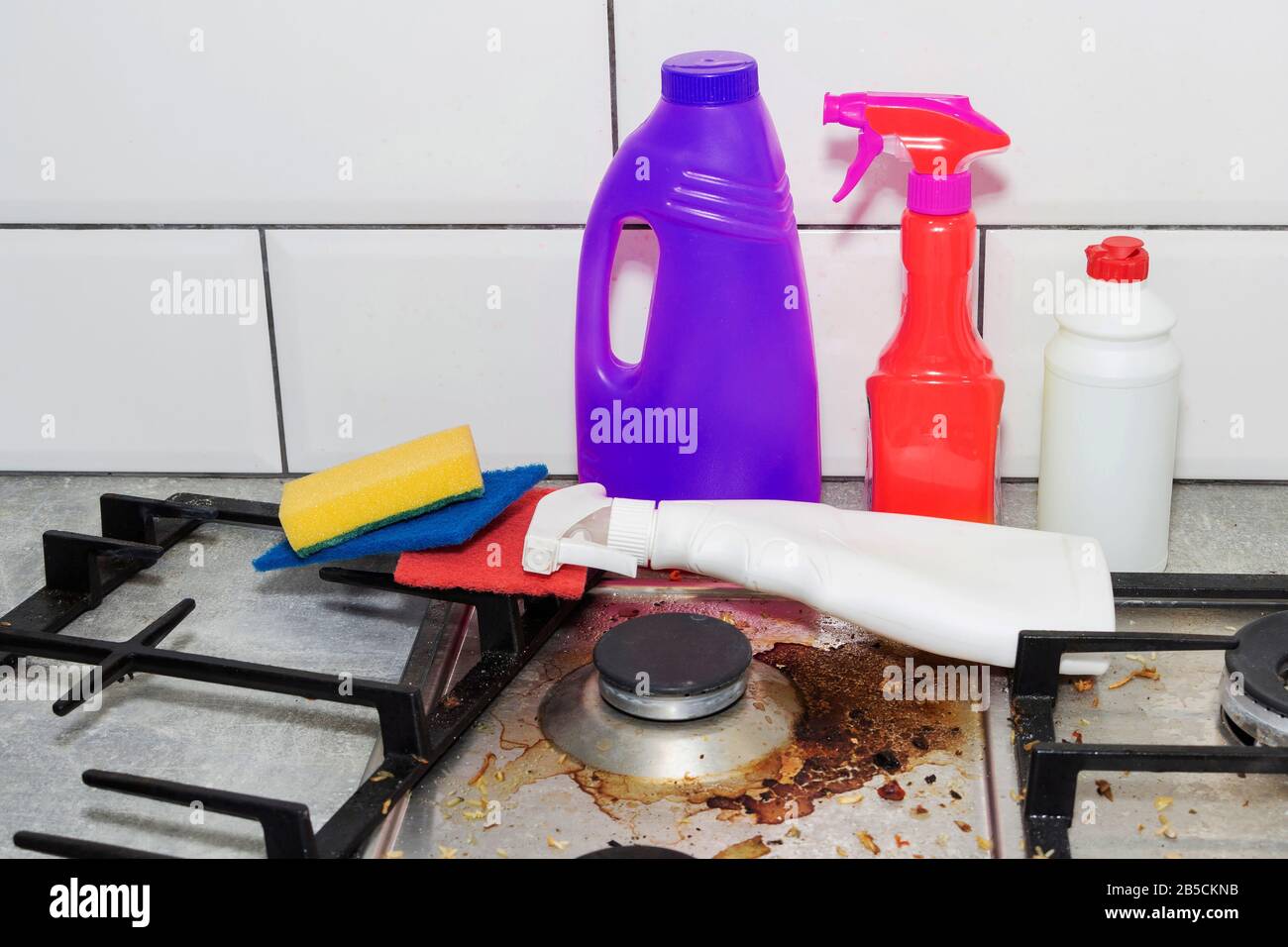Dirty, top of the gas stove with bits of food. House cleaning Stock