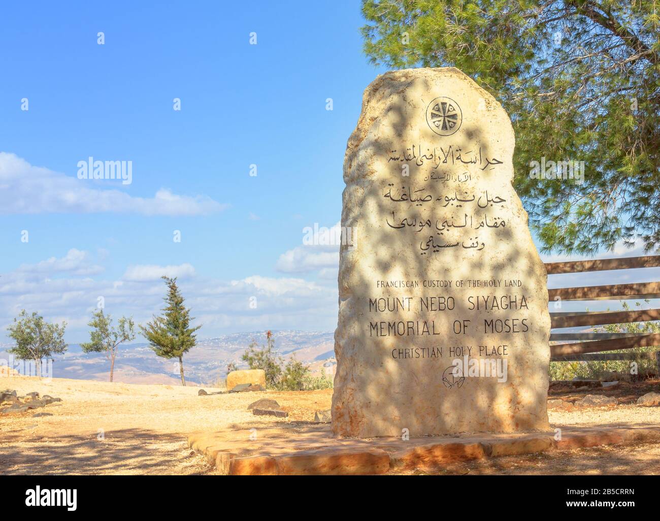 Mount Nebo, Jordan - Jan 3, 2020: Memorial stone of Moses of Promised Land at Mount Nebo, 710 meters above sea level. The view from the summit a Stock Photo