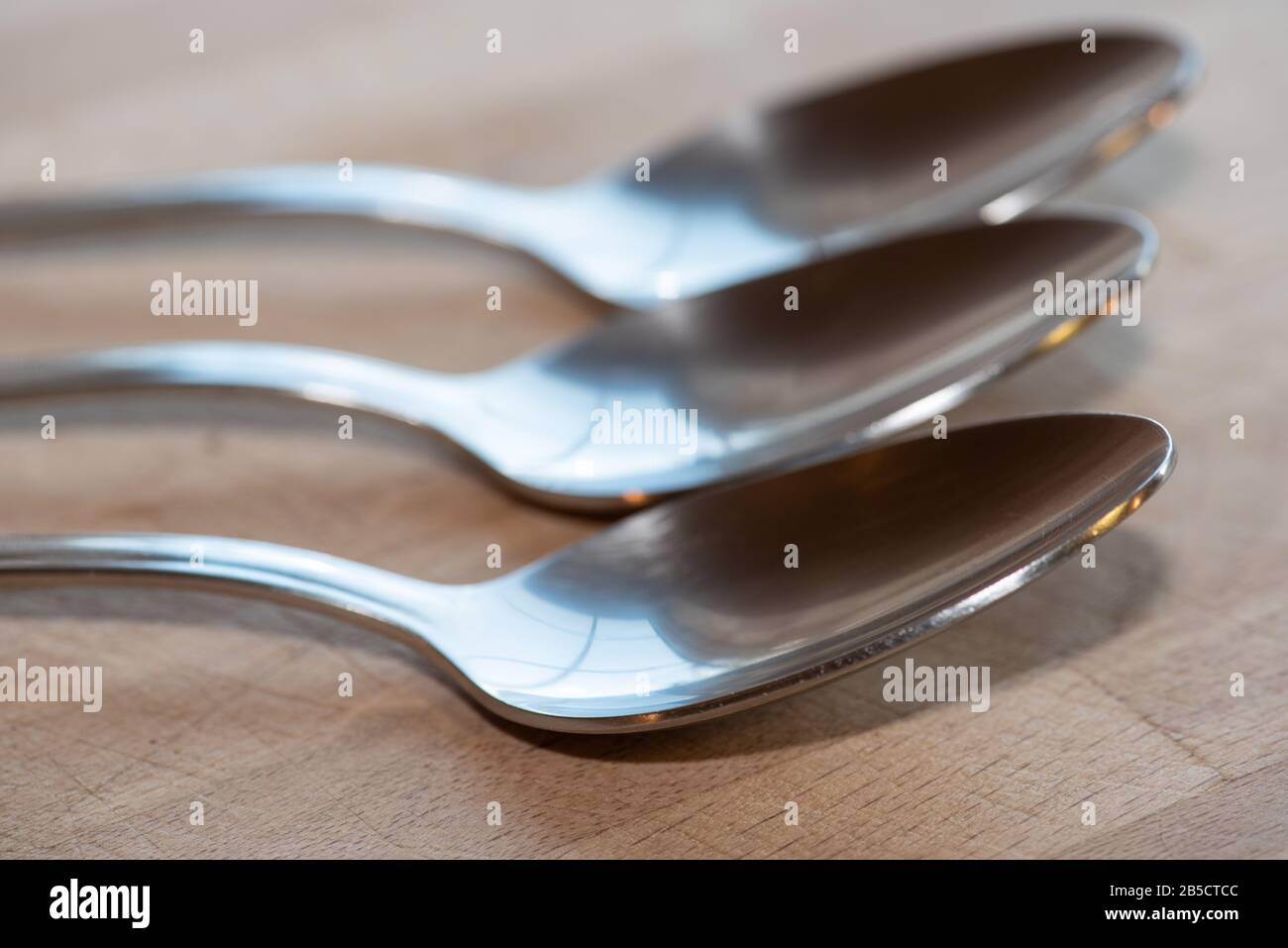 Stainless Steel desert spoons Cutlery Stock Photo
