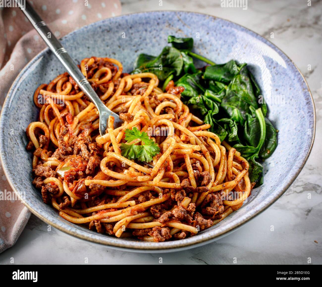 Spaghetti Bolognese with spinach Stock Photo Alamy