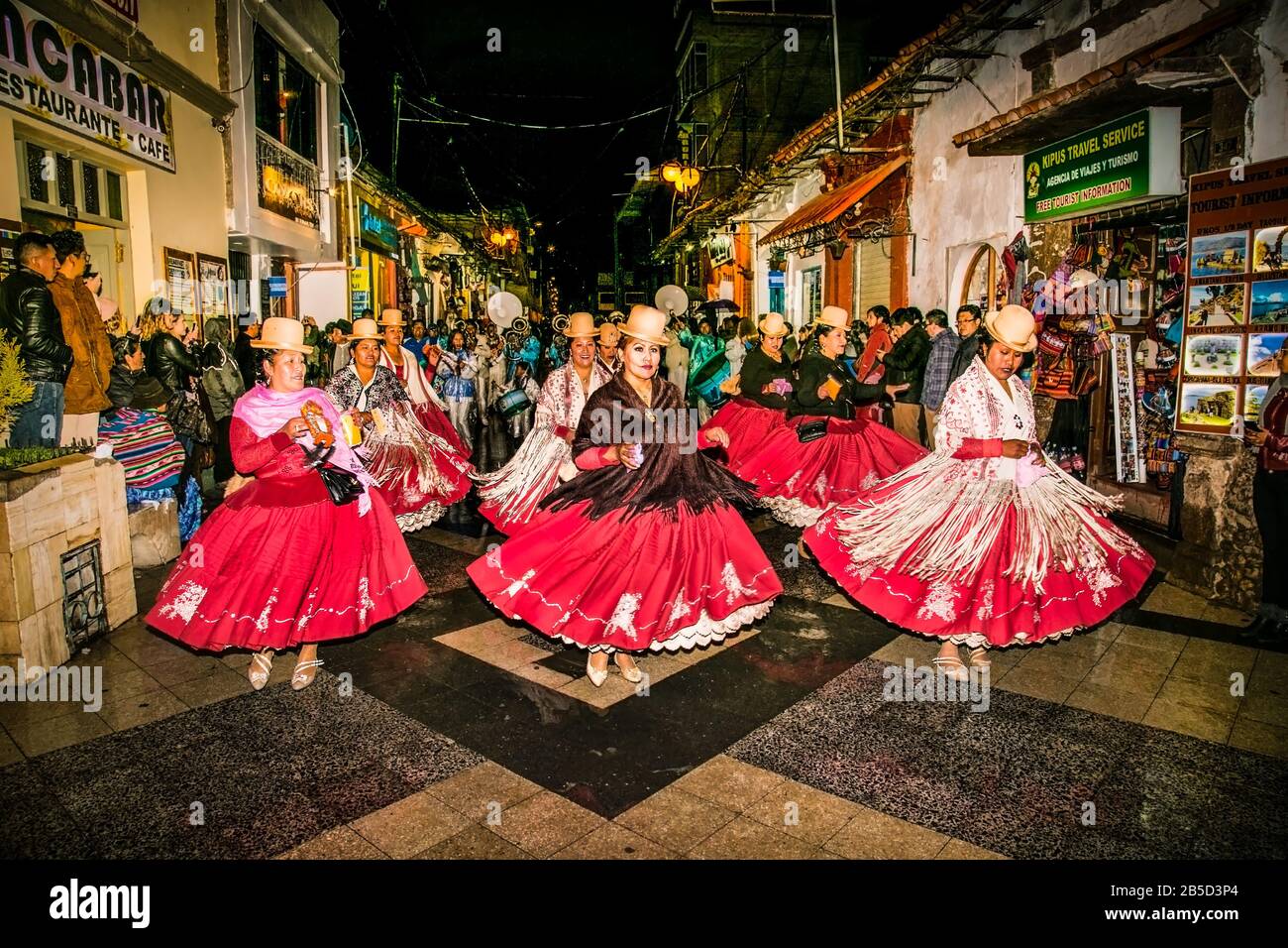 Puno, Peru - Jan 5, 2019: Authentic Colorful Carnival on the streets of Puno by night, Peru near the high altutude Titicaca lake . South America. Stock Photo