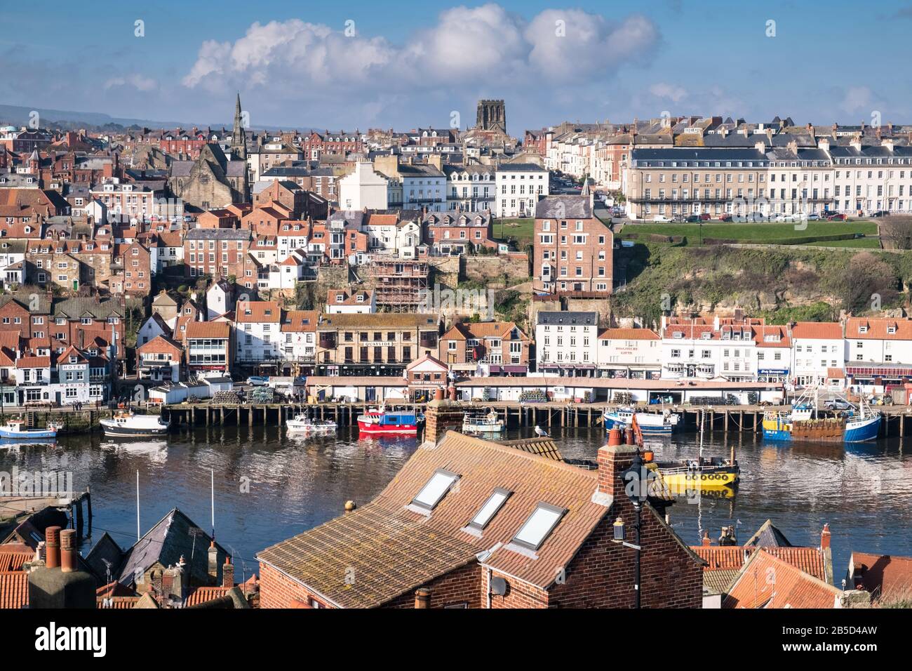 View of buildings and houses on the east side of Whitby harbour, a popular and picturesque town on the North Yorkshire coast, England, UK Stock Photo