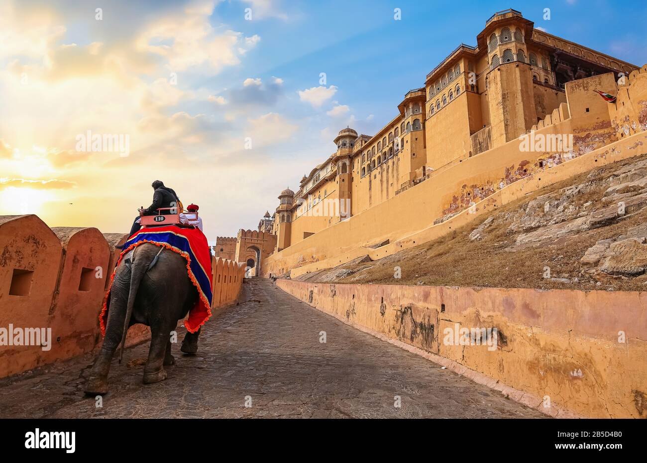 Amer Fort at Jaipur Rajasthan with view of decorated Indian elephant used for pleasure ride for tourist. Amber Fort is a UNESCO World Heritage site Stock Photo