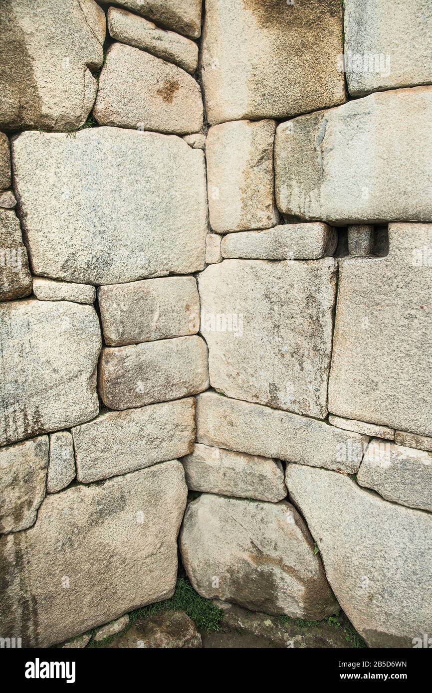 Incredible Inca Wall on Ancient city of Machu Picchu in Peru. South America.  Archaeological site. Stock Photo